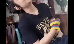 sexy school boy touching his nipples while playing guitar