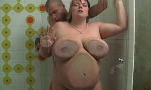 Huge BBW gives head and gets banged in the shower